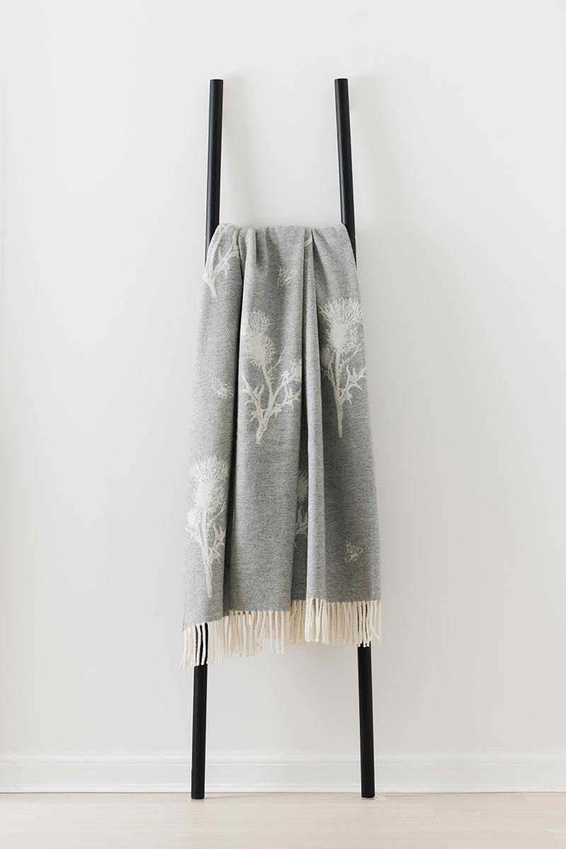 Nature Thistle and Bee Grey merino lambswool throw by Remony